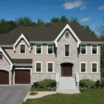 Installed Weatherwood hip and ridge shingles on asphalt roof peak