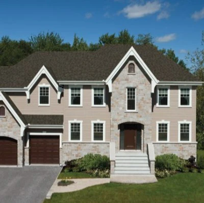 Installed Weatherwood hip and ridge shingles on asphalt roof peak